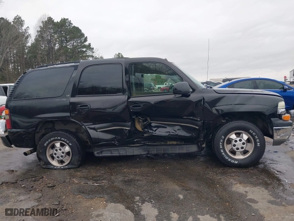 2003 Chevrolet Tahoe LS with VIN 1GNEC13Z73R243308, listed as a IAAI auction lot 41510266 with 246,378 mi miles. Bid and sale history available at carsss.com. Image 13.