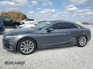 2018 Audi A5 Premium z VIN WAUNNAF54JA003363, wystawiony jako Copart lot #76783164 z przebiegiem 62 517 mil mil oraz Szkoda całkowita • Salvage title. Historia ofert i sprzedaży dostępna na DreamBid. Obrazek 1.