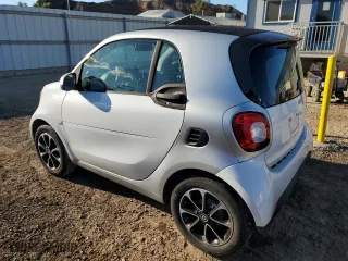 2017 Smart fortwo pure with VIN WMEFJ5DA6HK219988, listed as a Copart auction lot 71891414 with 9,731 mi miles and Clean Title. Bid and sale history available at carsss.com. Image 2.