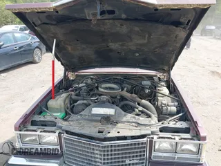 1985 Cadillac Seville z VIN 1G6KS6989FE821515, wystawiony jako IAAI lot #42009508 z przebiegiem 13 600 mil mil oraz . Historia ofert i sprzedaży dostępna na DreamBid. Obrazek 10.