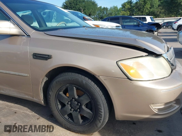 2001 Toyota Avalon XL z VIN 4T1BF28B31U185174, wystawiony jako IAAI lot #42338204 z przebiegiem 298 540 mil mil oraz . Historia ofert i sprzedaży dostępna na DreamBid. Obrazek 17.