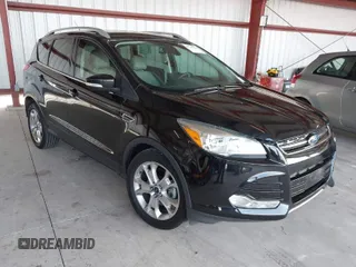 2015 Ford Escape Titanium with VIN 1FMCU0J98FUB95597, listed as a IAAI auction lot 41785188 with 84,141 mi miles. Bid and sale history available at carsss.com. Image 1.