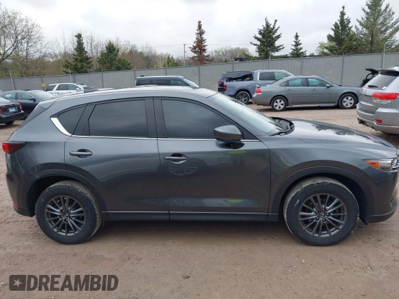 2020 Mazda CX-5 Touring with VIN JM3KFBCM2L0850855, listed as a IAAI auction lot 42147339 with 75,955 mi miles and . Bid and sale history available at carsss.com. Image 13.
