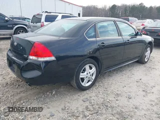 2014 Chevrolet Impala Limited Police Police with VIN 2G1WD5E35E1183561, listed as a IAAI auction lot 41693465 with 125,974 mi miles. Bid and sale history available at carsss.com. Image 4.