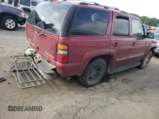 2004 Chevrolet Tahoe LT with VIN 1GNEC13Z84R298187, listed as a Copart auction lot 64256445 with 249,804 mi miles and Salvage title. Bid and sale history available at DreamBid. Image 4.