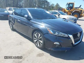 2019 Nissan Altima 2.5 Platinum with VIN 1N4BL4FV2KC113644, listed as a IAAI auction lot 41751975 with 125,617 mi miles. Bid and sale history available at carsss.com. Image 1.