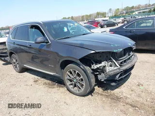 2017 BMW X5 xDrive35i with VIN 5UXKR0C54H0U52386, listed as a IAAI auction lot 42094176 with 128,805 mi miles. Bid and sale history available at carsss.com. Image 1.
