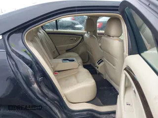 2014 Ford Taurus Limited with VIN 1FAHP2F87EG130532, listed as a IAAI auction lot 41618112 with 118,474 mi miles. Bid and sale history available at carsss.com. Image 8.