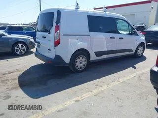 2015 Ford Transit Connect XLT z VIN NM0LS7F79F1203215, wystawiony jako IAAI lot #42217772 z przebiegiem 217 186 mil mil oraz . Historia ofert i sprzedaży dostępna na DreamBid. Obrazek 4.