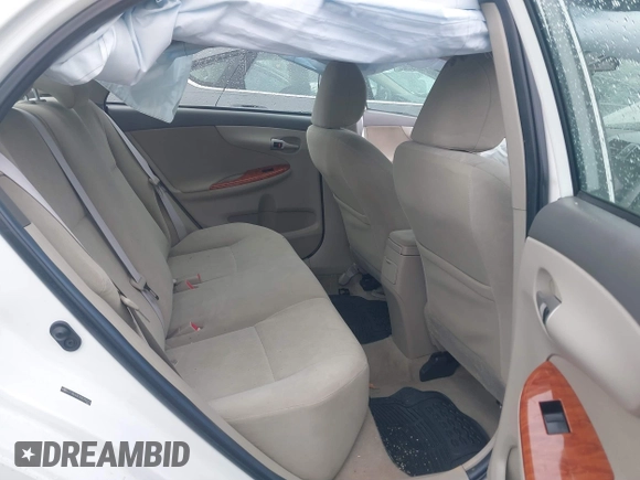 2009 Toyota Corolla with VIN 2T1BU40EX9C056272, listed as a IAAI auction lot 41522937 with 174,237 mi miles. Bid and sale history available at carsss.com. Image 8.