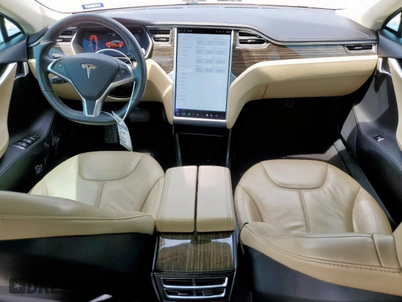 2014 Tesla Model S 60 with VIN 5YJSA1H18EFP38582, listed as a Copart auction lot 56581735 with 69,106 mi miles and Salvage title. Bid and sale history available at DreamBid. Image 8.