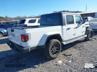 2023 Jeep Gladiator High Altitude with VIN 1C6HJTFG4PL560982, listed as a IAAI auction lot 41236477 with 28,835 mi miles and . Bid and sale history available at DreamBid. Image 4.