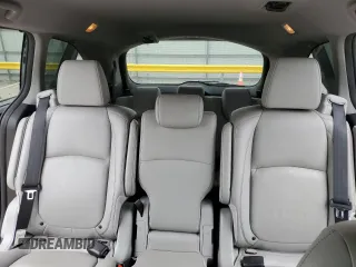 2018 Honda Odyssey Elite with VIN 5FNRL6H92JB024856, listed as a Copart auction lot 52409895 with 123,264 mi miles and Salvage title. Bid and sale history available at DreamBid. Image 10.