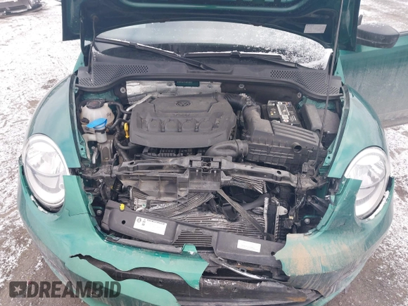 2018 Volkswagen Beetle S z VIN 3VWFD7AT7JM714915, wystawiony jako IAAI lot #41416623 z przebiegiem 49 134 mil mil oraz . Historia ofert i sprzedaży dostępna na DreamBid. Obrazek 10.