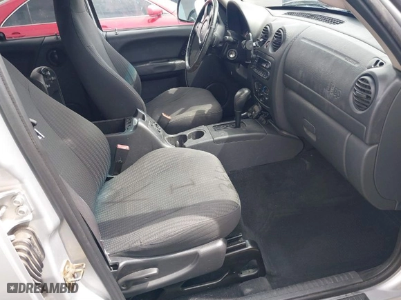 2003 Jeep Liberty Sport with VIN 1J4GL48KX3W674820, listed as a IAAI auction lot 41852729 with 246,363 mi miles. Bid and sale history available at carsss.com. Image 5.