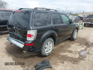 2011 Mercury Mariner with VIN 4M2CN8B7XBKJ01717, listed as a IAAI auction lot 42030587 with 115,766 mi miles and . Bid and sale history available at DreamBid. Image 4.
