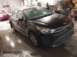 2022 Kia Rio S with VIN 3KPA24AD1NE440072, listed as a IAAI auction lot 41523593 with 28,446 mi miles. Bid and sale history available at carsss.com. Image 1.