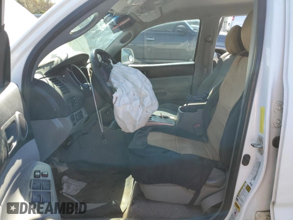 2010 Toyota Tacoma PreRunner with VIN 5TEJU4GN9AZ691581, listed as a Copart auction lot 50878855 with 236,777 mi miles and Salvage Title. Bid and sale history available at DreamBid. Image 7.