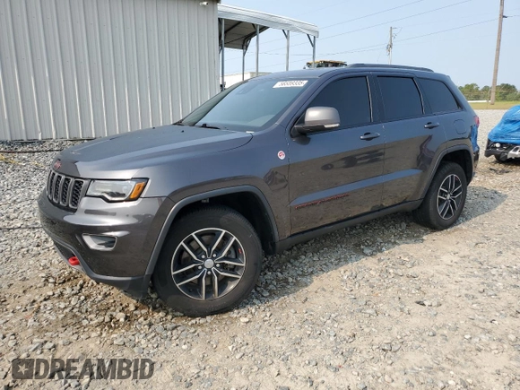2017 Jeep Grand Cherokee Trailhawk with VIN 1C4RJFLT3HC614449, listed as a Copart auction lot 58559335 with 153,051 mi miles and Salvage title. Bid and sale history available at DreamBid. Image 1.