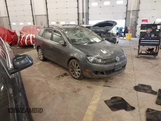 2014 Volkswagen Jetta SportWagen TDI w/Sunroof & Nav with VIN 3VWPL7AJ2EM627998, listed as a IAAI auction lot 41614718 with 134,203 mi miles. Bid and sale history available at carsss.com. Image 1.