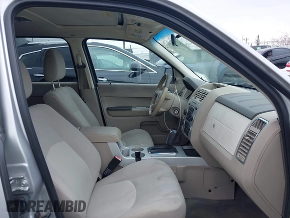 2008 Mercury Mariner with VIN 4M2CU81148KJ26119, listed as a IAAI auction lot 42189605 with 144,816 mi miles and . Bid and sale history available at DreamBid. Image 5.