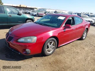 2004 Pontiac Grand Prix GT2 with VIN 2G2WS522141217359, listed as a IAAI auction lot 41677677 with 121,581 mi miles. Bid and sale history available at carsss.com. Image 2.