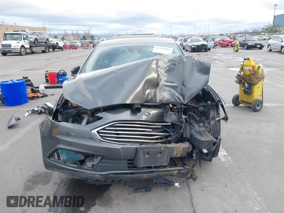 2018 Ford Fusion SE z VIN 3FA6P0LU8JR195096, wystawiony jako IAAI lot #41494088 z przebiegiem 114 007 mil mil oraz . Historia ofert i sprzedaży dostępna na DreamBid. Obrazek 6.