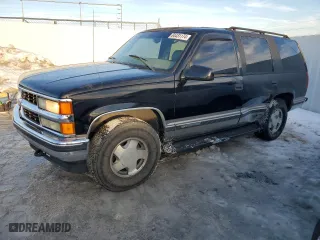 1998 Chevrolet Tahoe with VIN 1GNEK13R2WJ370599, listed as a Copart auction lot 84431174 with 197,215 mi miles and Non Repairable. Bid and sale history available at carsss.com. Image 1.