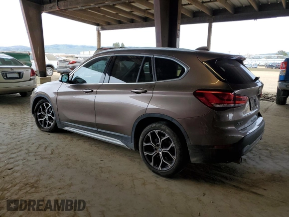 2020 BMW X1 xDrive28i with VIN WBXJG9C05L5R40935, listed as a Copart auction lot 47145335 with 46,554 mi miles and Salvage Title. Bid and sale history available at carsss.com. Image 2.