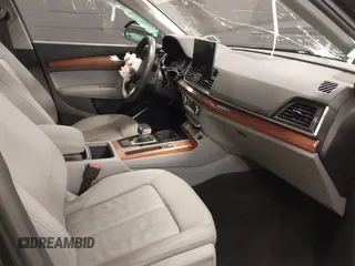2022 Audi Q5 S line Premium z VIN WA1GAAFY2N2049219, wystawiony jako IAAI lot #41772929 z przebiegiem 17 625 mil mil oraz . Historia ofert i sprzedaży dostępna na DreamBid. Obrazek 5.