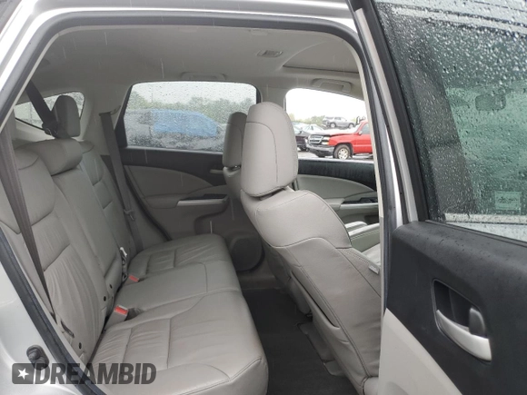 2013 Honda CR-V EX-L z VIN 2HKRM4H76DH634037, wystawiony jako Copart lot #57985265 z przebiegiem 80 399 mil mil oraz Szkody całkowita. Historia ofert i sprzedaży dostępna na DreamBid. Obrazek 11.
