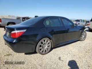 2010 BMW 5 Series 550i with VIN WBANW5C53ACT56674, listed as a Copart auction lot 70927084 with 129,722 mi miles and Salvage Title. Bid and sale history available at DreamBid. Image 3.