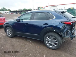 2022 Mazda CX-30 S Premium with VIN 3MVDMBDL0NM413545, listed as a IAAI auction lot 42493594 with 57,013 mi miles and . Bid and sale history available at DreamBid. Image 15.