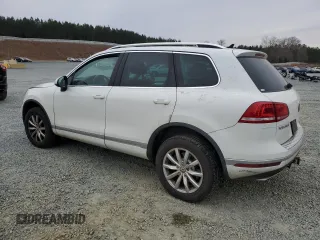 2015 Volkswagen Touareg Lux с VIN WVGEP9BP2FD002247, выставлен на аукционе Copart как лот 41924615 с пробегом 127 543 миль миль и Списание • Salvage title. История ставок и продаж доступна на DreamBid. Изображение 2.