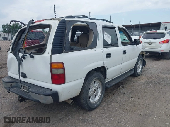 2002 Chevrolet Tahoe LT with VIN 1GNEC13Z52J341962, listed as a IAAI auction lot 42391522 with 239,452 mi miles and . Bid and sale history available at DreamBid. Image 4.