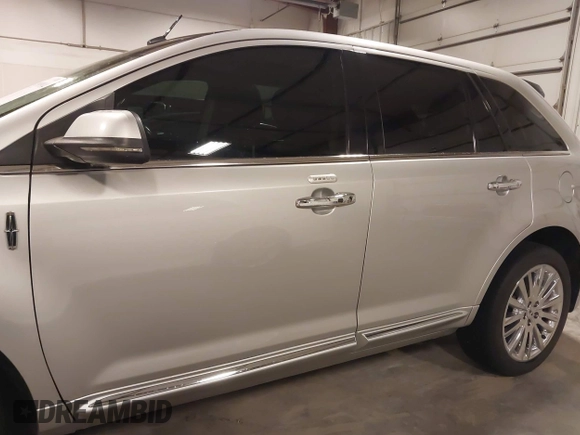 2012 Lincoln MKX with VIN 2LMDJ8JK2CBL11381, listed as a IAAI auction lot 41991914 with 157,193 mi miles and . Bid and sale history available at DreamBid. Image 14.