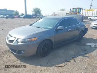 2009 Acura TSX z VIN JH4CU26609C033244, wystawiony jako IAAI lot #42400966 z przebiegiem 80 487 mil mil oraz . Historia ofert i sprzedaży dostępna na DreamBid. Obrazek 16.