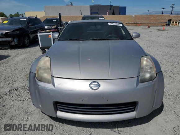 2003 Nissan 350Z Touring z VIN JN1AZ34EX3T016911, wystawiony jako Copart lot #54019395 z przebiegiem 163 228 mil mil oraz Czysty tytuł • Clean title. Historia ofert i sprzedaży dostępna na DreamBid. Obrazek 5.