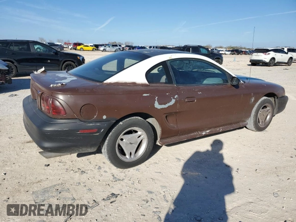 1997 Ford Mustang with VIN 1FALP4043VF174092, listed as a Copart auction lot 86983884 with 105,774 mi miles and Salvage Title. Bid and sale history available at carsss.com. Image 3.