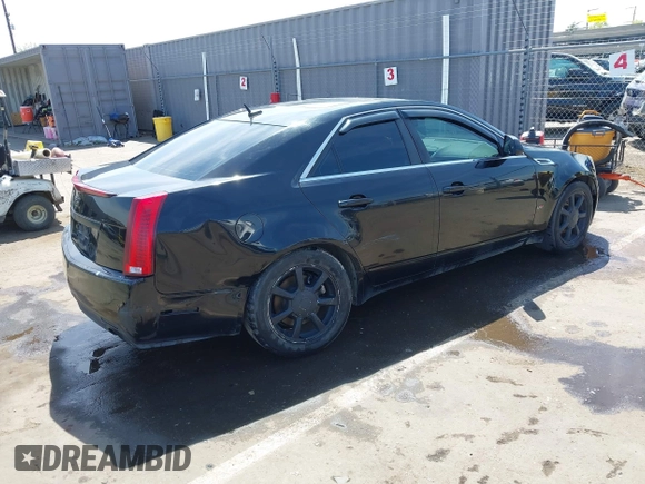 2008 Cadillac CTS RWD with VIN 1G6DV57VX80188428, listed as a IAAI auction lot 42033872 with 132,080 mi miles and . Bid and sale history available at DreamBid. Image 4.
