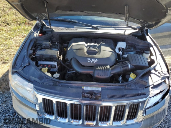 2012 Jeep Grand Cherokee Laredo with VIN 1C4RJFAG7CC299315, listed as a Copart auction lot 46174745 with 152,256 mi miles and Salvage Title. Bid and sale history available at carsss.com. Image 12.