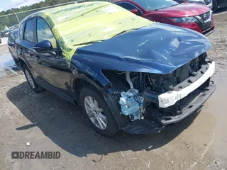 2016 Mazda CX-5 Touring with VIN JM3KE4CY0G0916908, listed as a IAAI auction lot 41848823 with 53,255 mi miles. Bid and sale history available at carsss.com. Image 1.