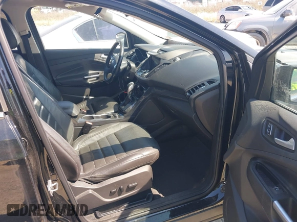 2016 Ford Escape Titanium with VIN 1FMCU0JX8GUC06601, listed as a IAAI auction lot 41785774 with 121,427 mi miles. Bid and sale history available at carsss.com. Image 5.