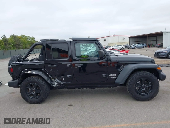 2018 Jeep Wrangler Unlimited Sport S with VIN 1C4HJXDG8JW105612, listed as a IAAI auction lot 42420765 with 54,873 mi miles and . Bid and sale history available at DreamBid. Image 12.