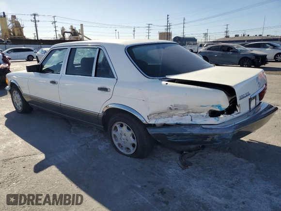 1986 Mercedes-Benz 560 with VIN WDBCA39D6GA238259, listed as a Copart auction lot 89204495 with 106,746 mi miles and Salvage Title. Bid and sale history available at DreamBid. Image 2.