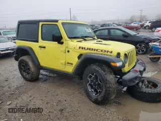 2023 Jeep Wrangler Rubicon with VIN 1C4HJXCG7PW693674, listed as a Copart auction lot 39764594 with 12,144 mi miles and . Bid and sale history available at DreamBid. Image 4.