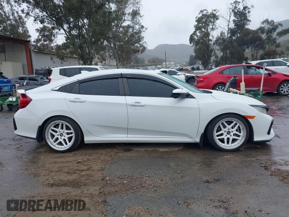 2020 Honda Civic Si z VIN 2HGFC1E59LH707630, wystawiony jako IAAI lot #41764310 z przebiegiem 116 714 mil mil oraz . Historia ofert i sprzedaży dostępna na DreamBid. Obrazek 14.