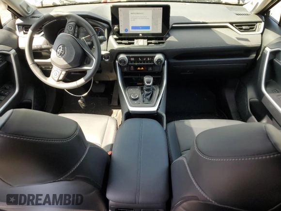 2024 Toyota RAV4 Hybrid XLE Premium with VIN JTMB6RFV7RD129471, listed as a Copart auction lot 53905745 with 8,869 mi miles and Salvage Title. Bid and sale history available at carsss.com. Image 8.