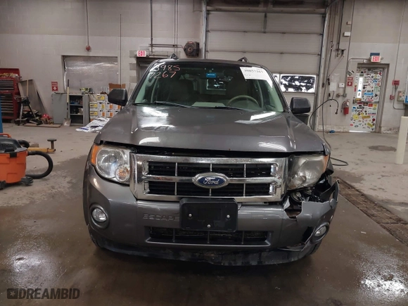 2011 Ford Escape XLT with VIN 1FMCU9D73BKB81871, listed as a IAAI auction lot 39857267 with 75,273 mi miles. Bid and sale history available at carsss.com. Image 12.