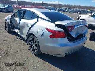 2016 Nissan Maxima SV z VIN 1N4AA6AP4GC446635, wystawiony jako IAAI lot #41672861 z przebiegiem 118 377 mil mil oraz . Historia ofert i sprzedaży dostępna na DreamBid. Obrazek 3.